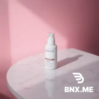/imagine prompt: skincare product on marble table, soft pink light, Instagram style,俯拍 --ar 3:4 --style raw