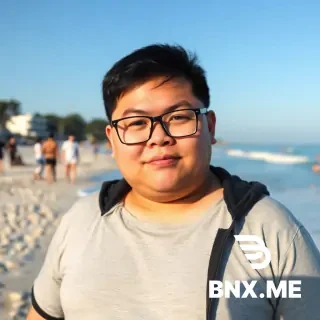 Asian chubby guy with glasses. 18 years old. At a beach.