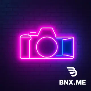 Neon sign logo for a photographer. The silhouette of a camera body or lens shape drawn in glowing magenta and cyan neon tubing. Realistic light bloom and haze effect on a dark charcoal brick wall background. Cyberpunk edge, music venue vibe, high resolution, ultra detailed --ar 2:1