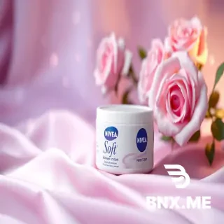 3D product animation, cinematic lighting. A white tub of Nivea Soft cream sits elegantly on swirling, soft pastel purple silk fabric. Gentle bokeh sparkles and magical glittering dust drift slowly across the frame. In the soft-focus background, light purple roses gently sway. The camera slowly pans and zooms in on the product, capturing a luminous, soft glowing aura around the jar. Hyper-realistic, 4K, smooth motion, commercial grade.
